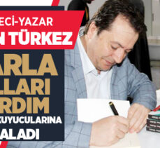 Gazeteci-Yazar Ayhan Türkez kitabını imzaladı