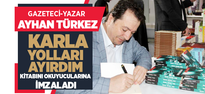 Gazeteci-Yazar Ayhan Türkez kitabını imzaladı
